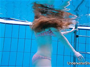 gorgeous doll displays wonderful bod underwater