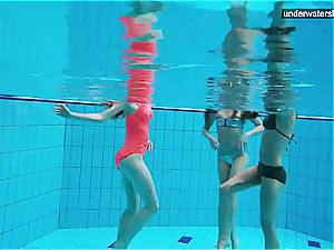 3 nude gals have joy underwater
